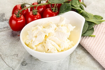Soft cream cheese in the bowl