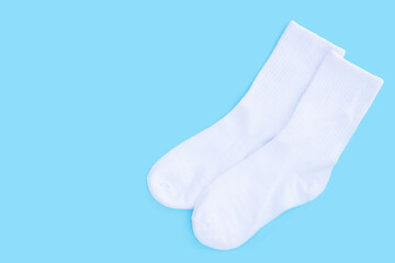 White socks on blue background.