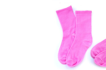 Pink socks on white background.