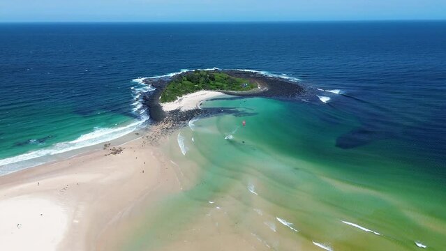 Drone aerial people kitesurfing off Pacific beach island sandbar waves nature travel tourism Bendalong Manyana South Coast Australia