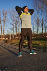 Runner stretching before training