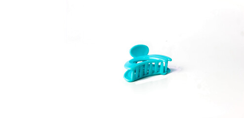 Blue Jaws Hair Clip Isolated on a  Transparent Background. Left Copy Space