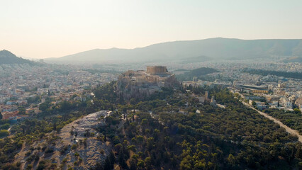Fototapeta na wymiar Athens, Greece. Acropolis of Athens in the light of the morning sun. Summer, Aerial View