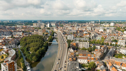 Ghent, Belgium. Keizerpark - City park. Esco (Scheldt) river embankment. Panorama of the city from...
