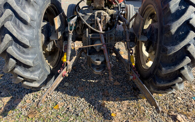 The power take-off or PTO shaft on an old farming tractor