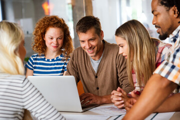 Business solutions, technology and strategy concept. Colleagues working and brainstorming in office