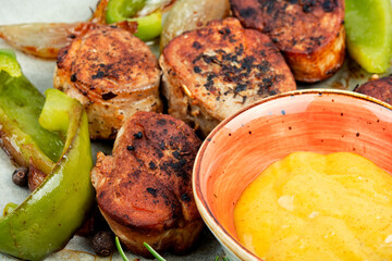 Filet mignon steak from pork tenderloin.