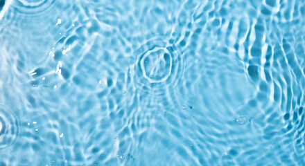 Water surface waving Close-up . Blue Water Flowing