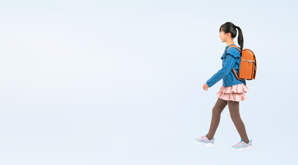Fototapeta na wymiar ランドセルを背負って歩く女子小学生（切り抜き背景透過PNGも販売しております。作成者リンクから「PNG」で検索してください）