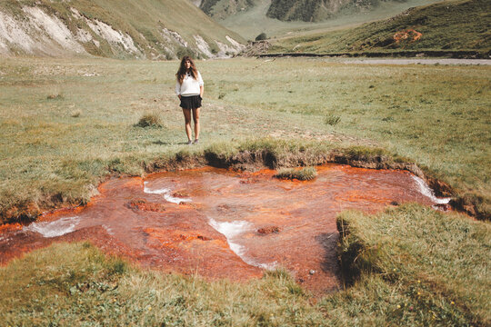 Woman standing near Abano lake in Truso valley. Georgia