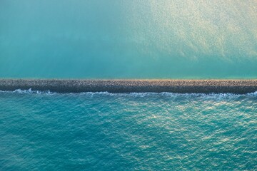 breakwater wall in the sea - Powered by Adobe