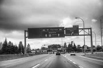 Vancouver, Canada - August 13, 2017: Road to Vancouver with traffic signs
