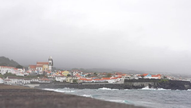 Foggy Sao Mateus da Calheta with crashing waves along the Atlantic coast in Terceira, Azores