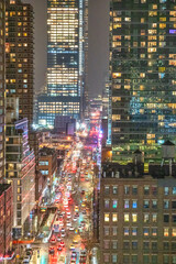 Midtown Manhattan at night. Panoramic aerial view of New York City skyscrapers