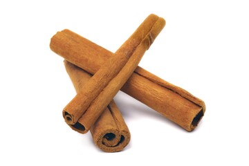 Fragrant cinnamon sticks isolated on white background.