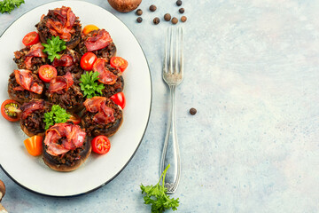 Roasted stuffed mushroom caps, space for text.