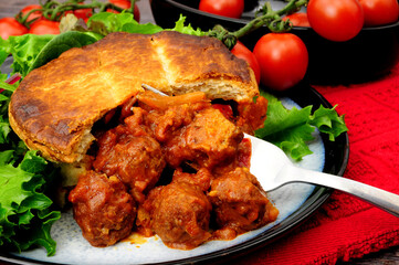 Pork and beef meatball marinara puff pastry pie meal