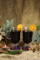 Glasses with mulled wine and spices
