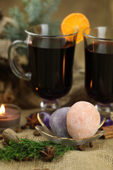 Glasses with mulled wine and spices