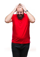 Naklejka premium Young caucasian hipster man wearing red shirt over isolated background suffering from headache desperate and stressed because pain and migraine. Hands on head.