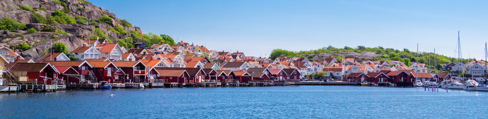 Hunnebostrand, Sweden - May 24, 2023: Panorama of the fishing town and tourist resort of Hunnebostrand in the swedish municipality of Sotenas, Vastra Gotaland province. - obrazy, fototapety, plakaty