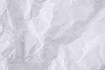 White crumpled paper texture background, clean white wrinkled paper, top view.
