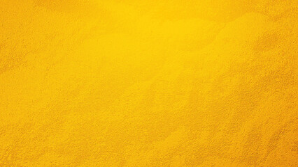 Cement wall background with blurred light Gradient golden yellow tones