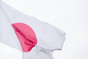 Waving Flag of Japan in White Background. Japan Flag on pole for Independence day. The symbol of the state on wavy fabric. Close-up. Great for news