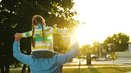 caring parent, dad with daughter park, little beloved daughter, walk outdoors, child smile, outdoors, loving father guardian, vacation, kindergarten, nanny walks with a child spring, caring loving - obrazy, fototapety, plakaty