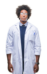 Afro american doctor scientist man over isolated background with serious expression on face. Simple and natural looking at the camera.