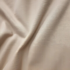 beige linen fabric arranged in waves, linen texture closeup, a piece of linen material, folds in...