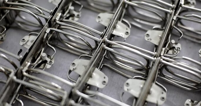 Set of metal clips with rings for folders A4. Paper fasteners and stationery