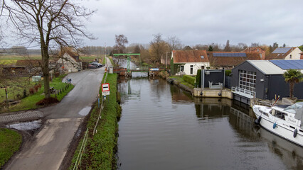 Fototapeta na wymiar drone images of bridges on the Moervaart river in Moerbeke, East Flanders, Belgium