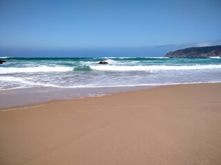 Fototapeta na wymiar Waves of the Atlantic Ocean. The edge of Europe. Portugal.