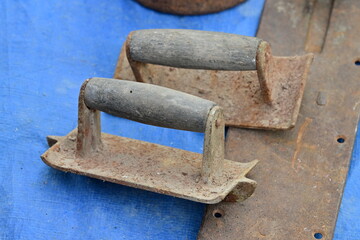Old, rusty construction tools on flea market in Spain.