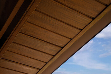 Roof overhang with metal siding © Sergey