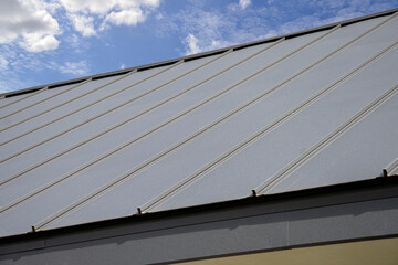 Gray Seam Metal Roof on sky background
