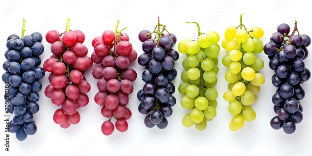 Poster a row of different colored grapes on a white surface. suitable for food and beverage-related designs