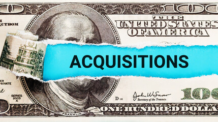 Acquisitions. The word Acquisitions in the background of the US dollar. Business Takeover and...