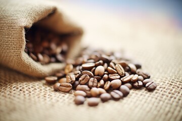 close-up of coffee beans on burlap sack - obrazy, fototapety, plakaty