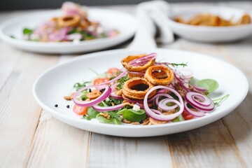 Fototapeta na wymiar farro salad with red onion rings and balsamic glaze