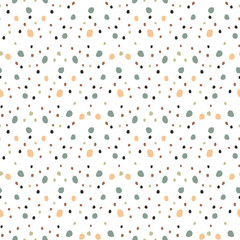 Ditsy seamless pattern with pastel dots on white background