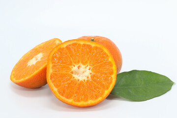 fresh tangerines on white background