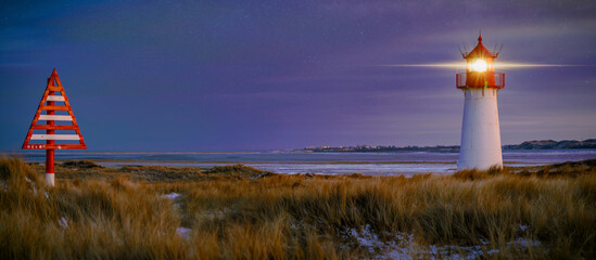 The beacon on Sylt West shortly after sunset presents a picturesque scene. The sky over the North...