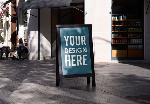 Mockup of customizable A-frame sign outside shop
