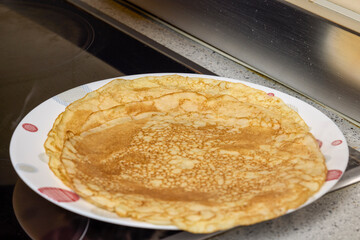 Traditional Romanian pancakes prepared to be eaten with different types of sweets.