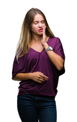 Young beautiful blonde elegant woman over isolated background touching mouth with hand with painful expression because of toothache or dental illness on teeth. Dentist concept.