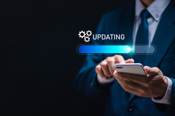 Person use smartphone with virtual installing update bar. Software updates or operating system...
