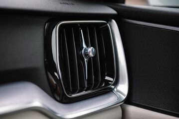 Deflector. car ventilation system. Car air conditioner closeup. Automotive climate control. Airflow inside the car. Interior element of a modern premium car. Detail interior. Air ducts.