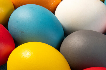 eggs painted in different colors to symbolize the passage of Christian Easter